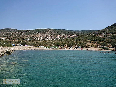 DİKİLİ BADEMLİ'DE 35.568 M² KOMPLE SATILIK ARAZİ FIRSATI